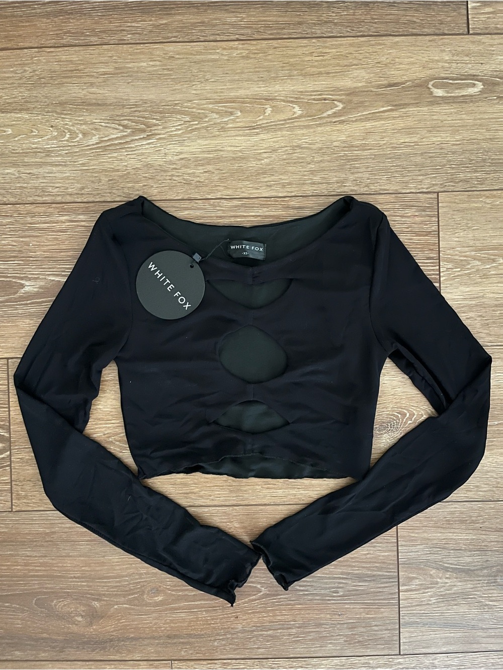 White Fox Boutique Black Long Sleeve Cutout Crop Top